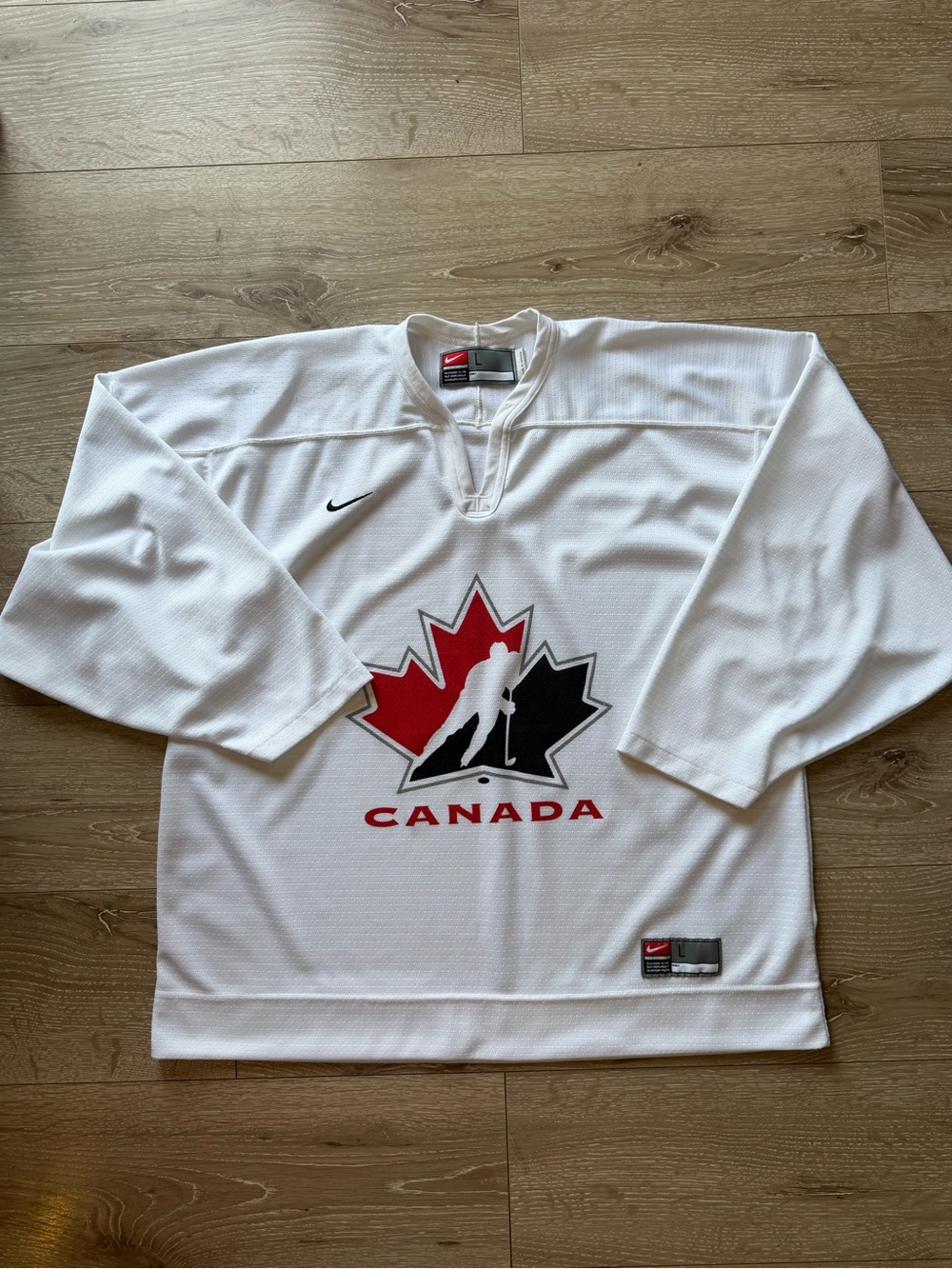 Nike White Canada Hockey Jersey with Red and Black Logo